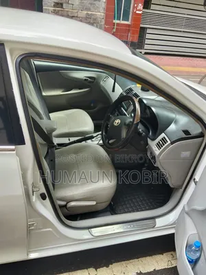 টয়োটা অ্যাক্সিও ২০১২ সাদা
