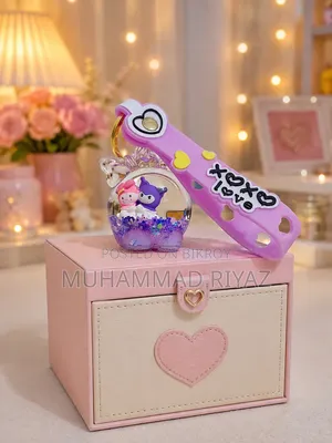 Melody and Kuromi Floating Liquid Keychain Features a Purple