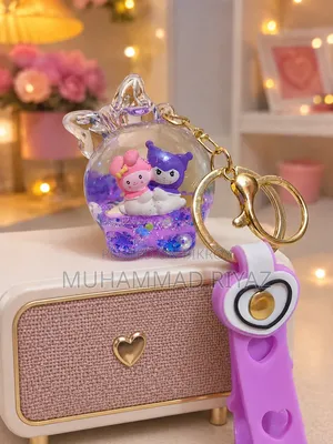Melody and Kuromi Floating Liquid Keychain Features a Purple