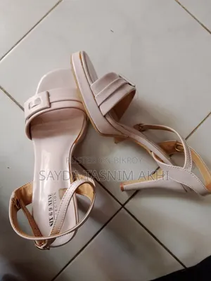 Black Heels 1 Time Use. White Heels 3/4 Time Used. Size 38