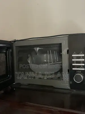 Microwave 2 Months Used, Completely New, Papers Available, 2 Years Warranty