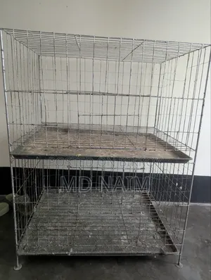 A 2-story thick wire pigeon cage