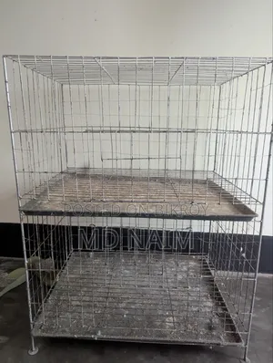 A 2-story thick wire pigeon cage