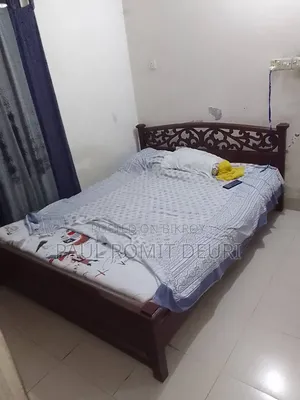 Akter Double Wooden Bed