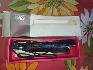 চুল স্ট্রেইট করার যন্ত্র