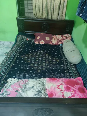 আধুনিক ডিজাইনের সুন্দর পার্টেক্স/মেলামাইন বোর্ডের ডাবল খাট বিক্রি হবে
