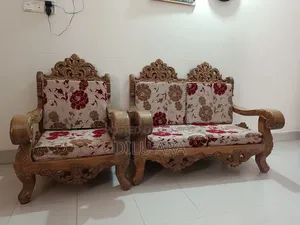 সেগুন কাঠের সোফা।