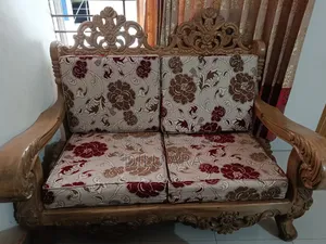সেগুন কাঠের সোফা।