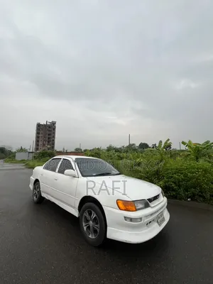 টয়োটা করোল্লা ১৯৯৭ সাদা