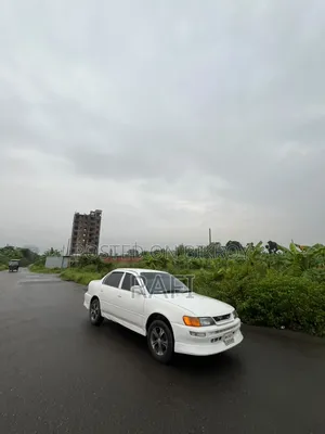 টয়োটা করোল্লা ১৯৯৭ সাদা