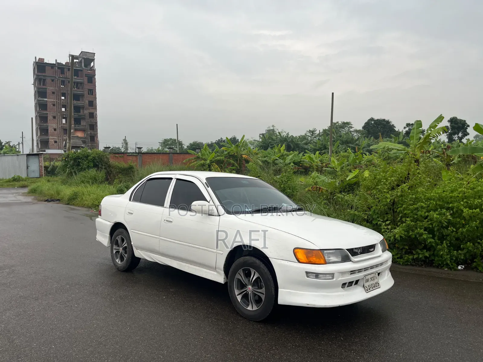 টয়োটা করোল্লা ১৯৯৭ সাদা