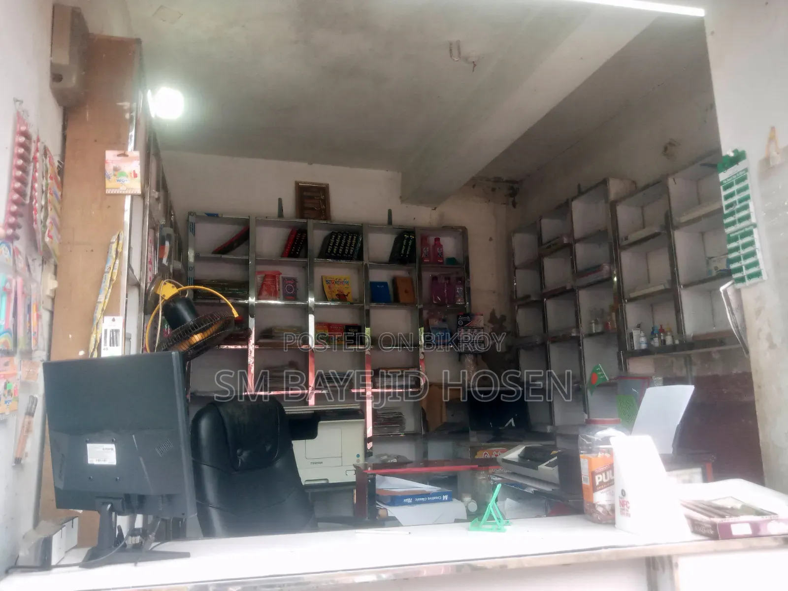 Goods of a running computers, photocopying, and stationery shop are for sale.