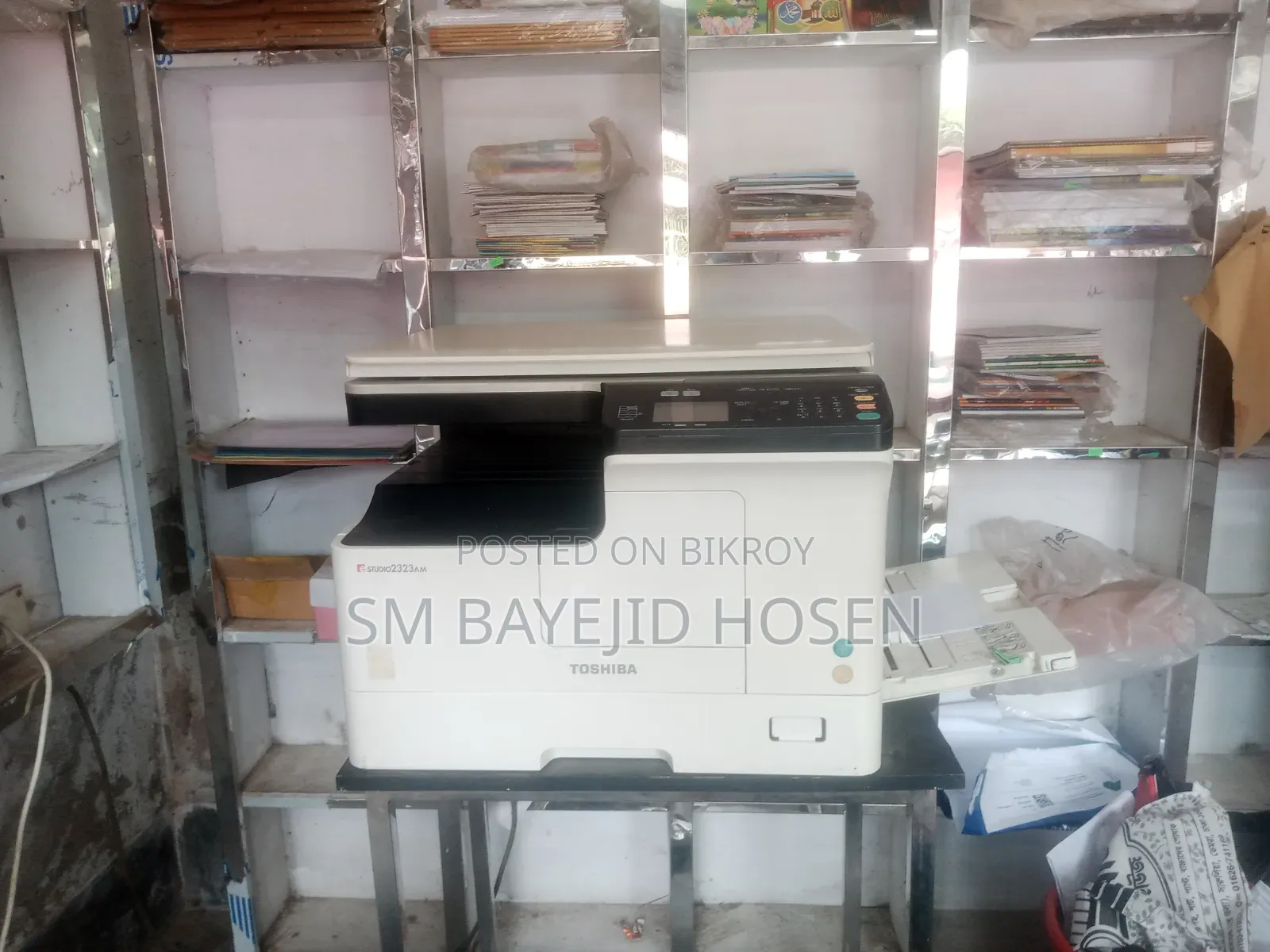 Goods of a running computers, photocopying, and stationery shop are for sale.