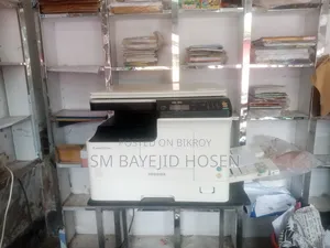Goods of a running computers, photocopying, and stationery shop are for sale.