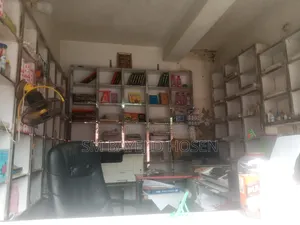 Goods of a running computers, photocopying, and stationery shop are for sale.