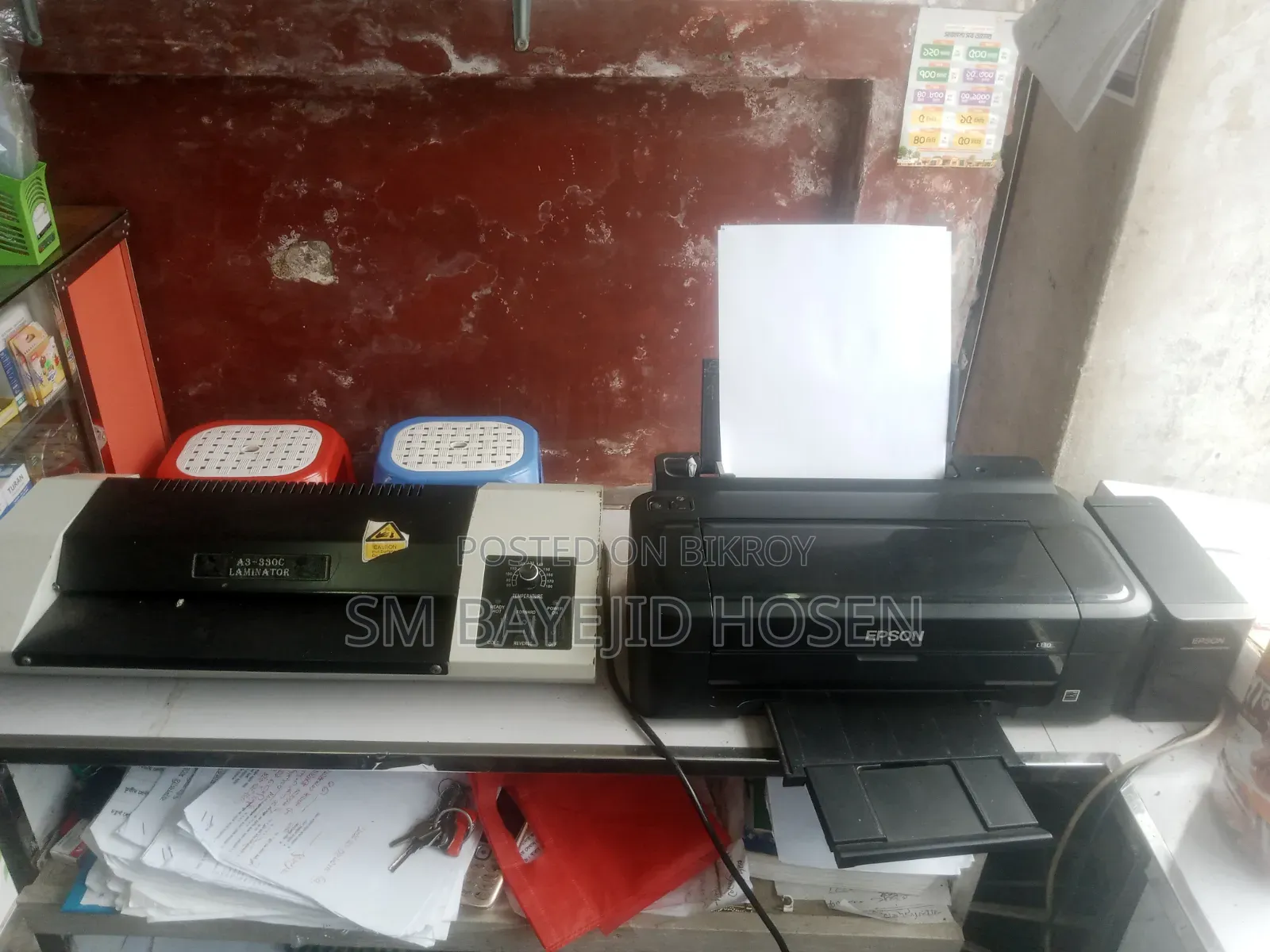 Goods of a running computers, photocopying, and stationery shop are for sale.