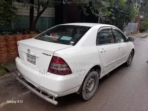 টয়োটা করোল্লা সেডান অটোমেটিক ২০০৪ হোয়াইট