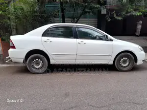 টয়োটা করোল্লা সেডান অটোমেটিক ২০০৪ হোয়াইট