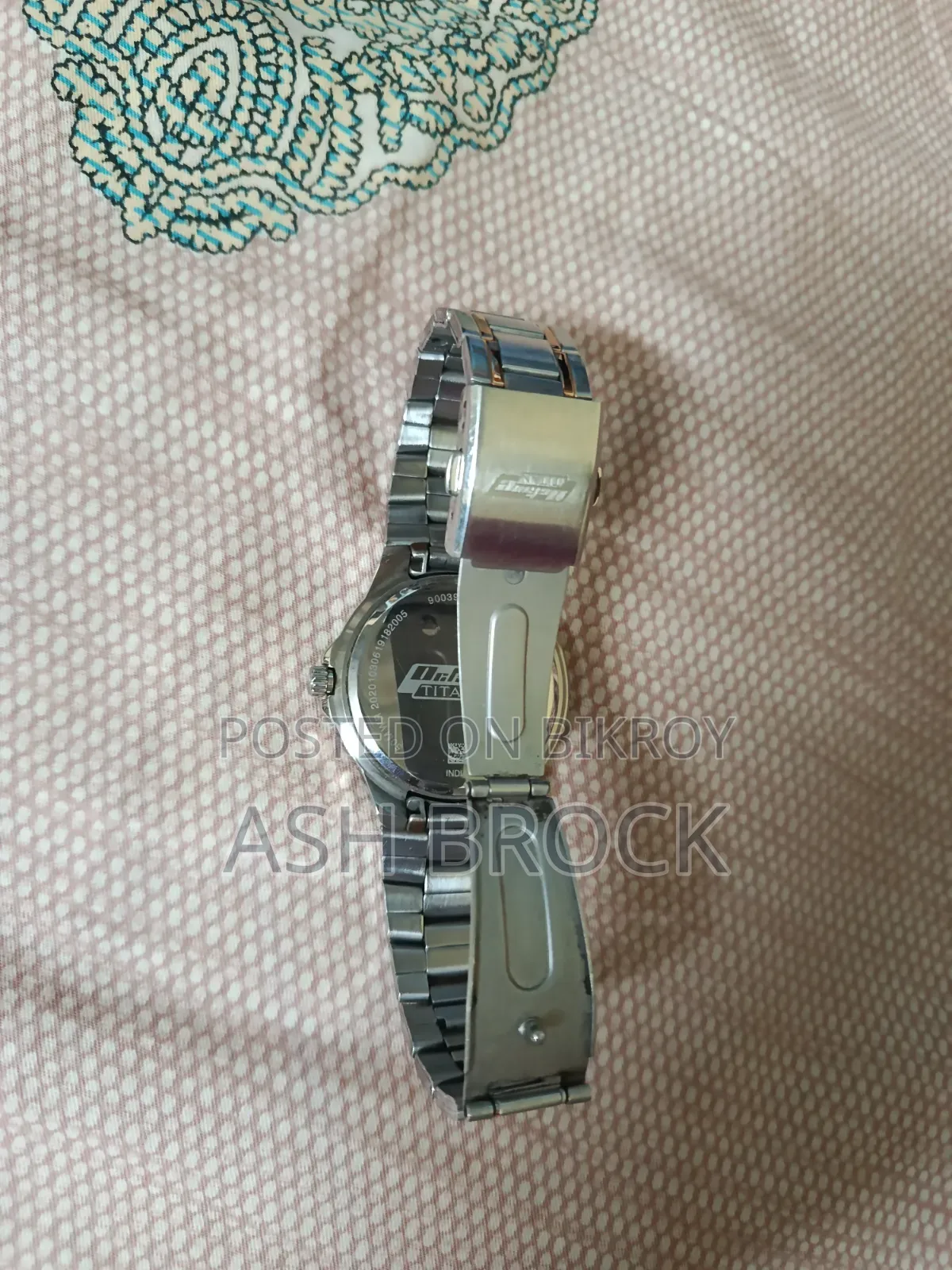 টাইটান অকটেন ৯০০৩৯কেএম০২