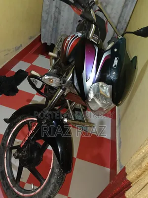 Bajaj Discover 100 2013 Purple
