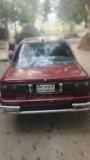 টয়োটা করোল্লা ১.৬ সেডান ১৯৮৯ লাল
