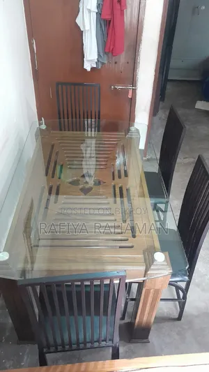 A 6-chair glass frame dining table will be sold.