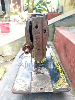 Original Butterfly Foot Sewing Machine and Stand for Sale
