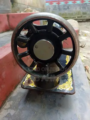 Original Butterfly Foot Sewing Machine and Stand for Sale