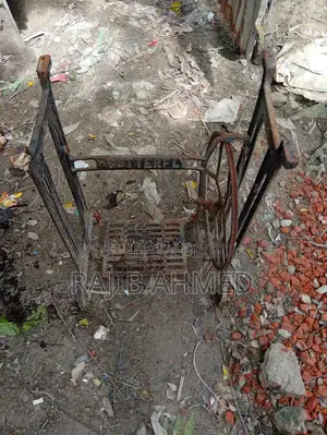 Original Butterfly Foot Sewing Machine and Stand for Sale