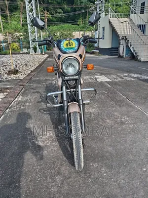 টিভিএস এক্সএল ১০০ কমফোর্ট ২০২৩ ব্রাউন
