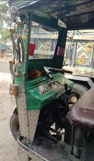 গ্রিন টাইগার আই অটো ২ ২০১০ সবুজ