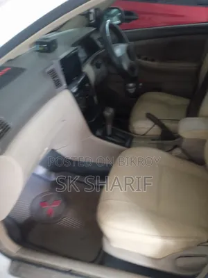টয়োটা করোল্লা ২০০৪ সাদা