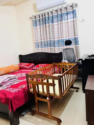 Baby Wooden Cot With Mosquito Net Wheel