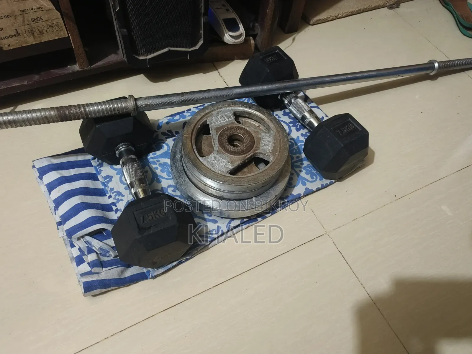 Dumbbell and Barbell Plates With Bar