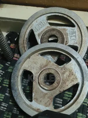 Dumbbell and Barbell Plates With Bar