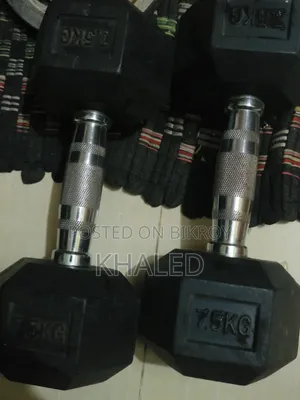 Dumbbell and Barbell Plates With Bar