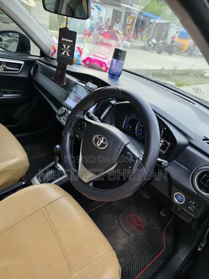 টয়োটা অ্যাক্সিও ২০১৩ মেরুন