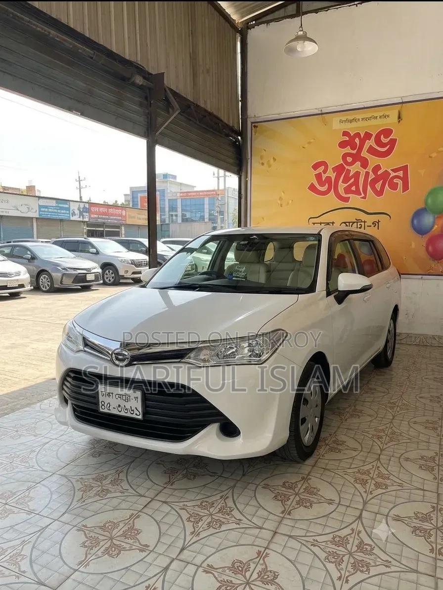 টয়োটা এক্সিও ২০১৫ সাদা