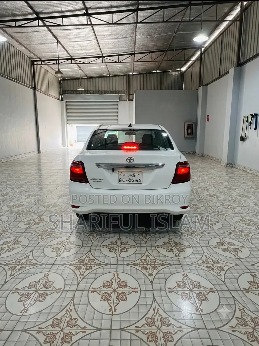 টয়োটা এক্সিও ২০১৫ সাদা