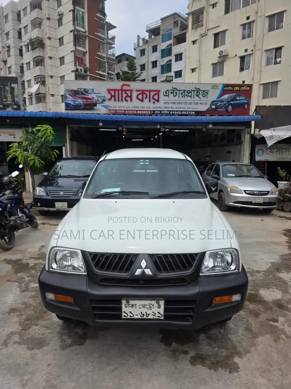 মিতসুবিশি এল২০০ ২০০৬ সাদা