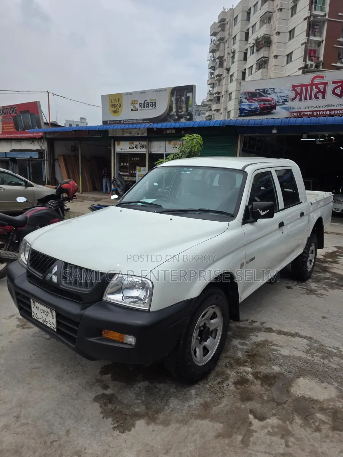 মিতসুবিশি এল২০০ ২০০৬ সাদা