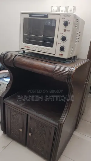 Household goods made of mahogany wood or furniture for holding an oven