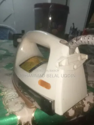জামা -কাপড় আয়রন মেশিন