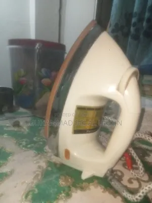 জামা -কাপড় আয়রন মেশিন