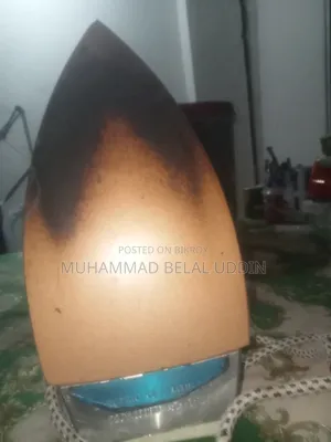 জামা -কাপড় আয়রন মেশিন