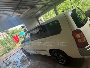 টয়োটা প্রোবক্স ২০০৩ অফ হোয়াইট