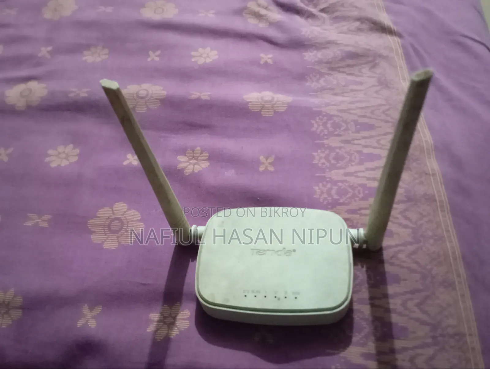 এটি Tenda (টেন্ডা) ব্র্যান্ডের N301 মডেলের রাউটার। Wireless N300