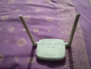এটি Tenda (টেন্ডা) ব্র্যান্ডের N301 মডেলের রাউটার। Wireless N300