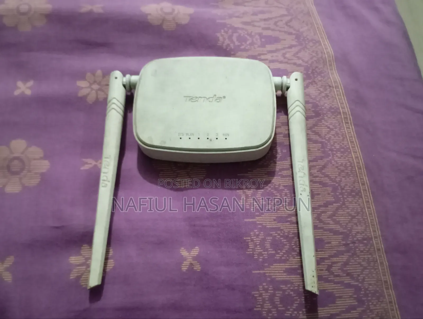 এটি Tenda (টেন্ডা) ব্র্যান্ডের N301 মডেলের রাউটার। Wireless N300