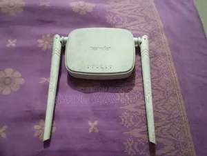 এটি Tenda (টেন্ডা) ব্র্যান্ডের N301 মডেলের রাউটার। Wireless N300